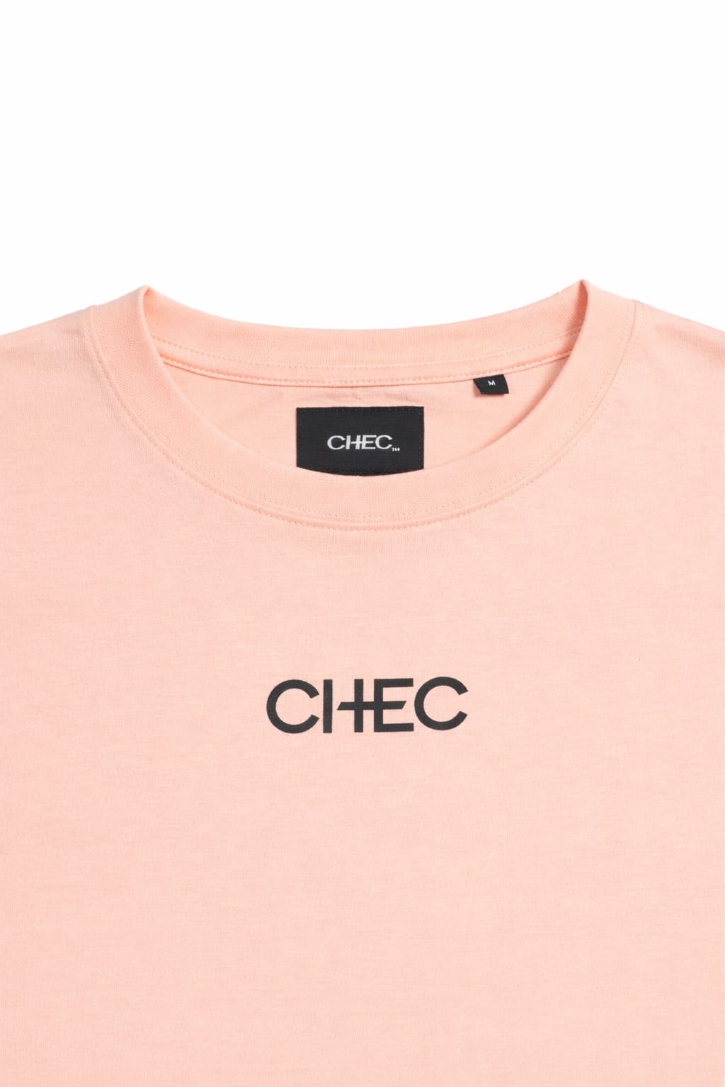 BOXY CROP LOGO TEE PEACH NECK CLOSEUP Creole Pink