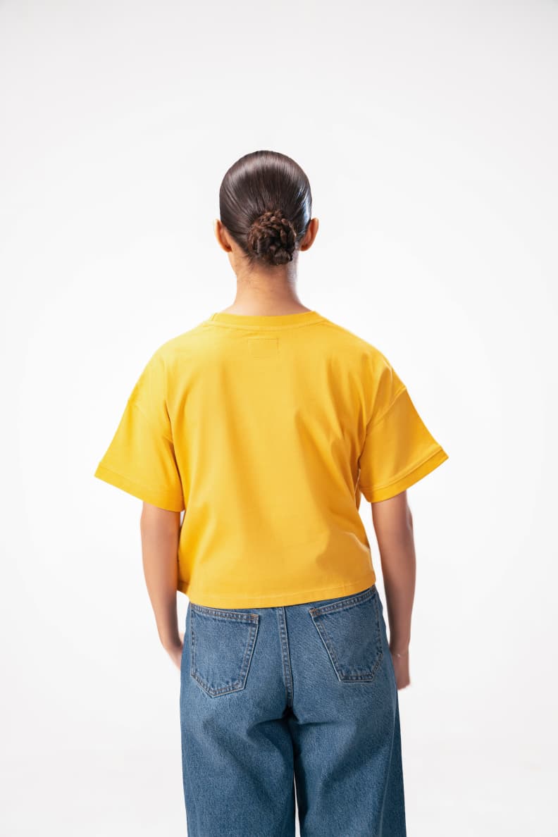 BOXY CROP LOGO TEE YELLOW BACK POSE Mineral Yellow