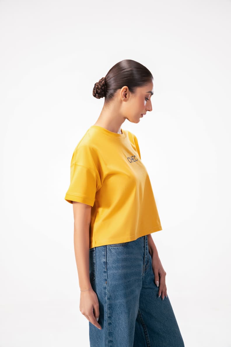 BOXY CROP LOGO TEE YELLOW SIDE POSE Mineral Yellow