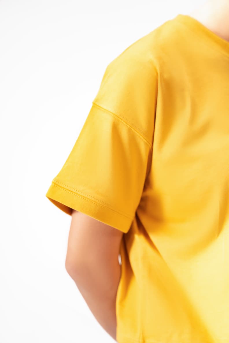BOXY CROP LOGO TEE YELLOW SLEEVE CLOSEUP Mineral Yellow