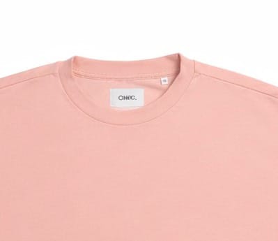 INTERLOCK LUXURY TEE PEACH NECK CLOSEUP Rose Quartz