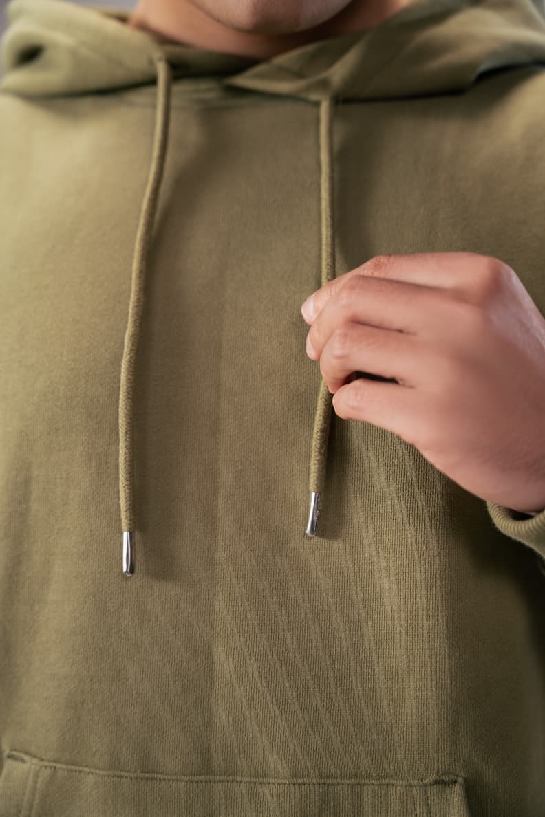 Relaxed Fit Hoodie Olive Drawstrings Closeup Martini olive Dark