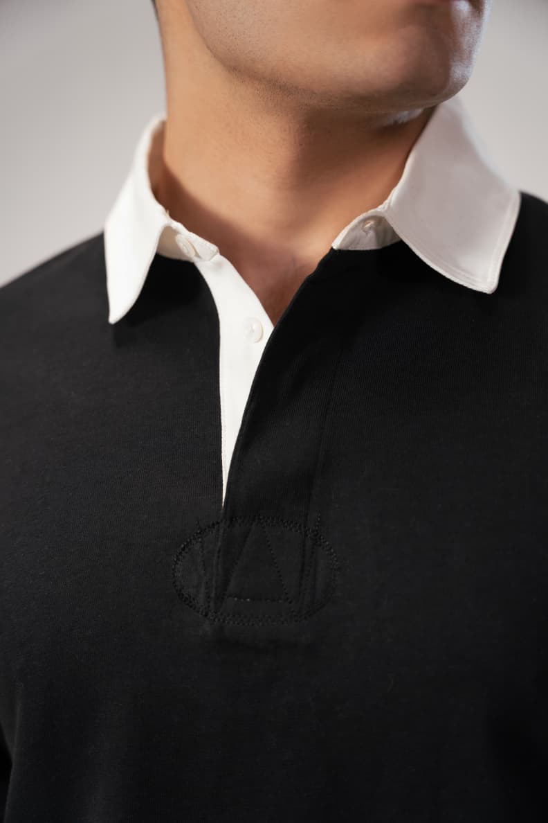 Close-up of white collar and placket on rugby shirt Black/White